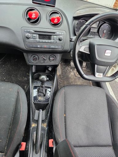 SEAT Ibiza Front Cabin Before Interior Detailing SEAT Ibiza dashboard and centre console before interior valet, cleaning and pet hair removal
